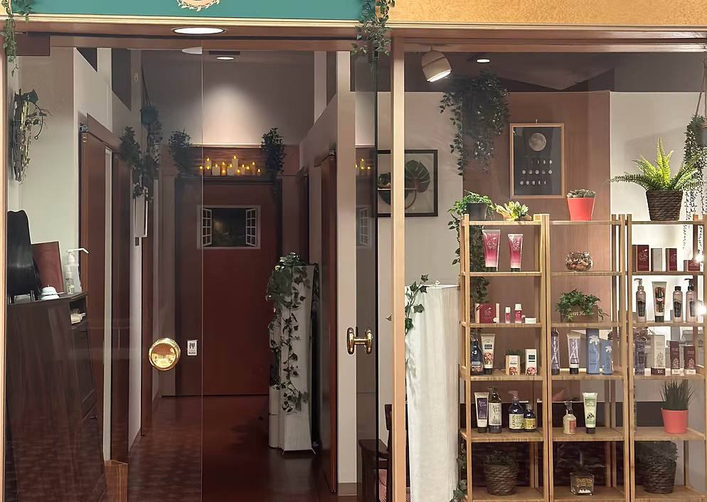 Elegant spa interior with professional massage therapy setup, featuring serene lighting and luxurious wellness atmosphere perfect for booking appointments